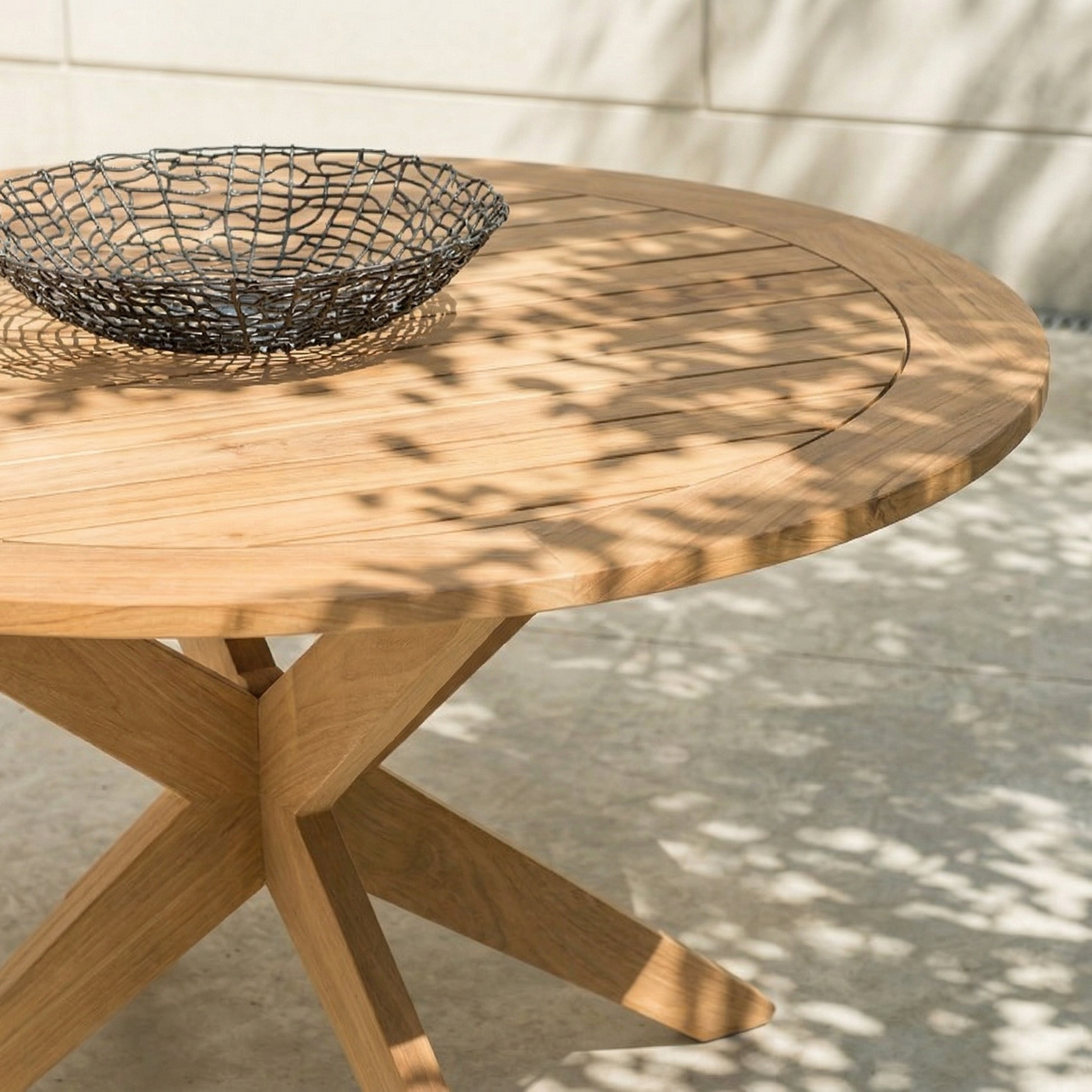 close up detail of the circular dining table in roble wood