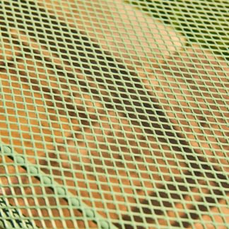 Close-up of a green metal mesh