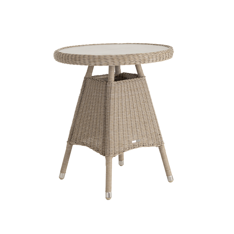 Round wicker side table on a white background