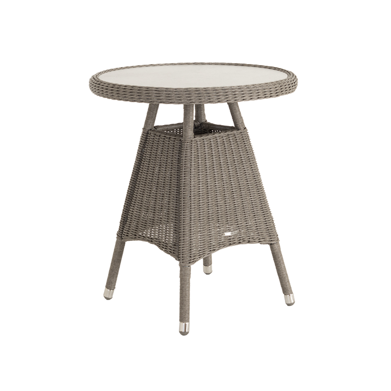 Round wicker table with a glass top on a white background