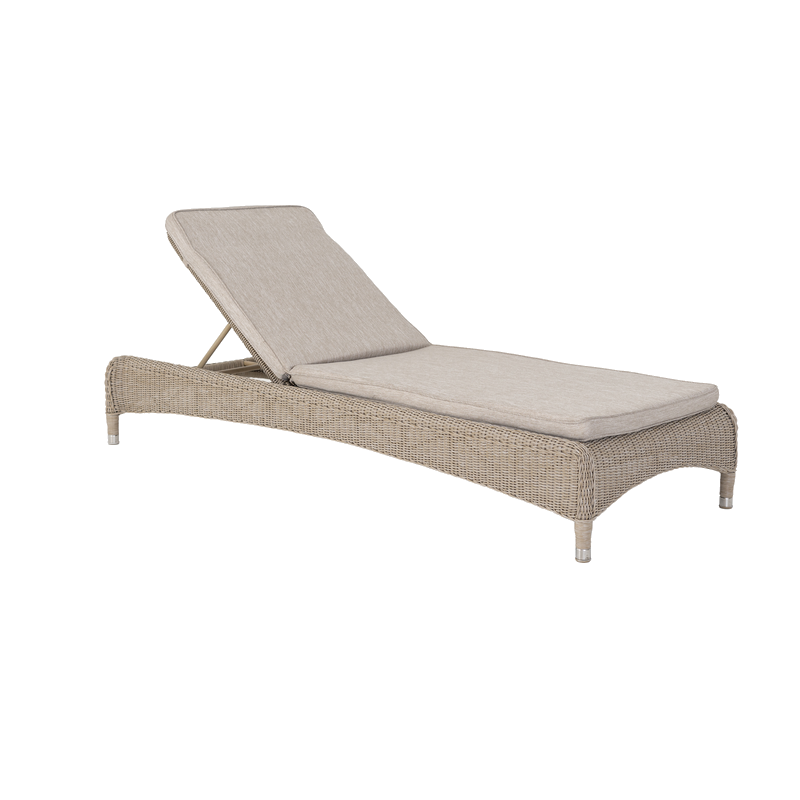 Beige wicker sun lounger with a cushion on a white background