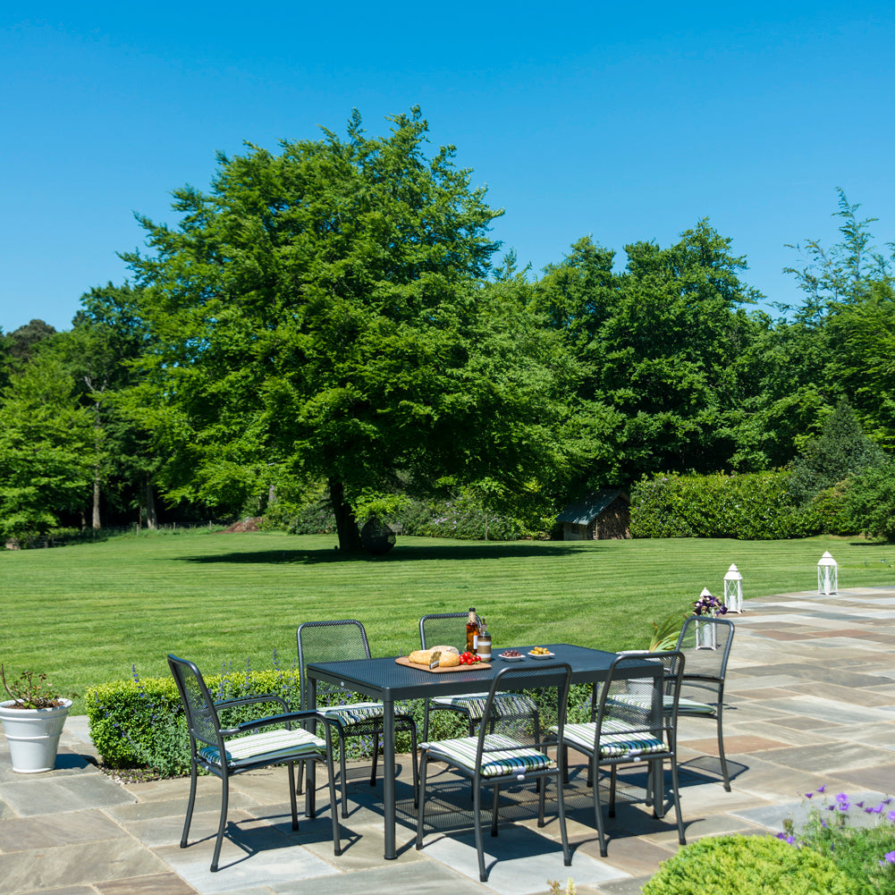 metal garden furniture outdoors in garden setting