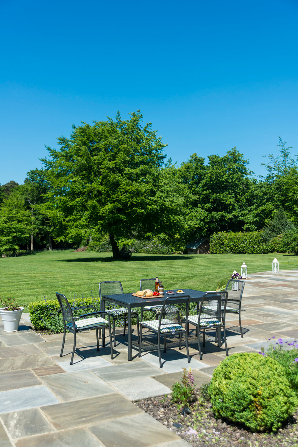 metal garden furniture outdoors in garden setting