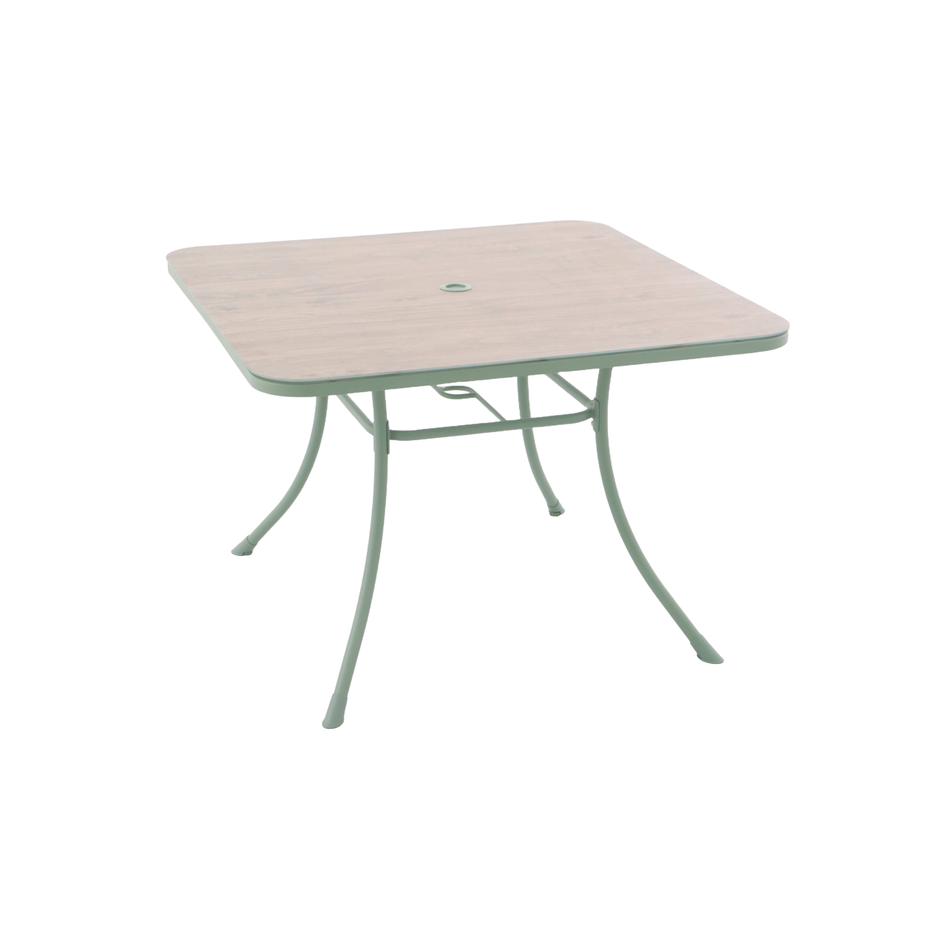 Square table with a light-colored top and green metal legs on a white background