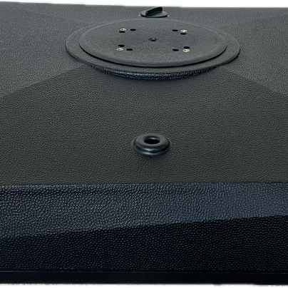 Black rectangular object with a circular component on a white background