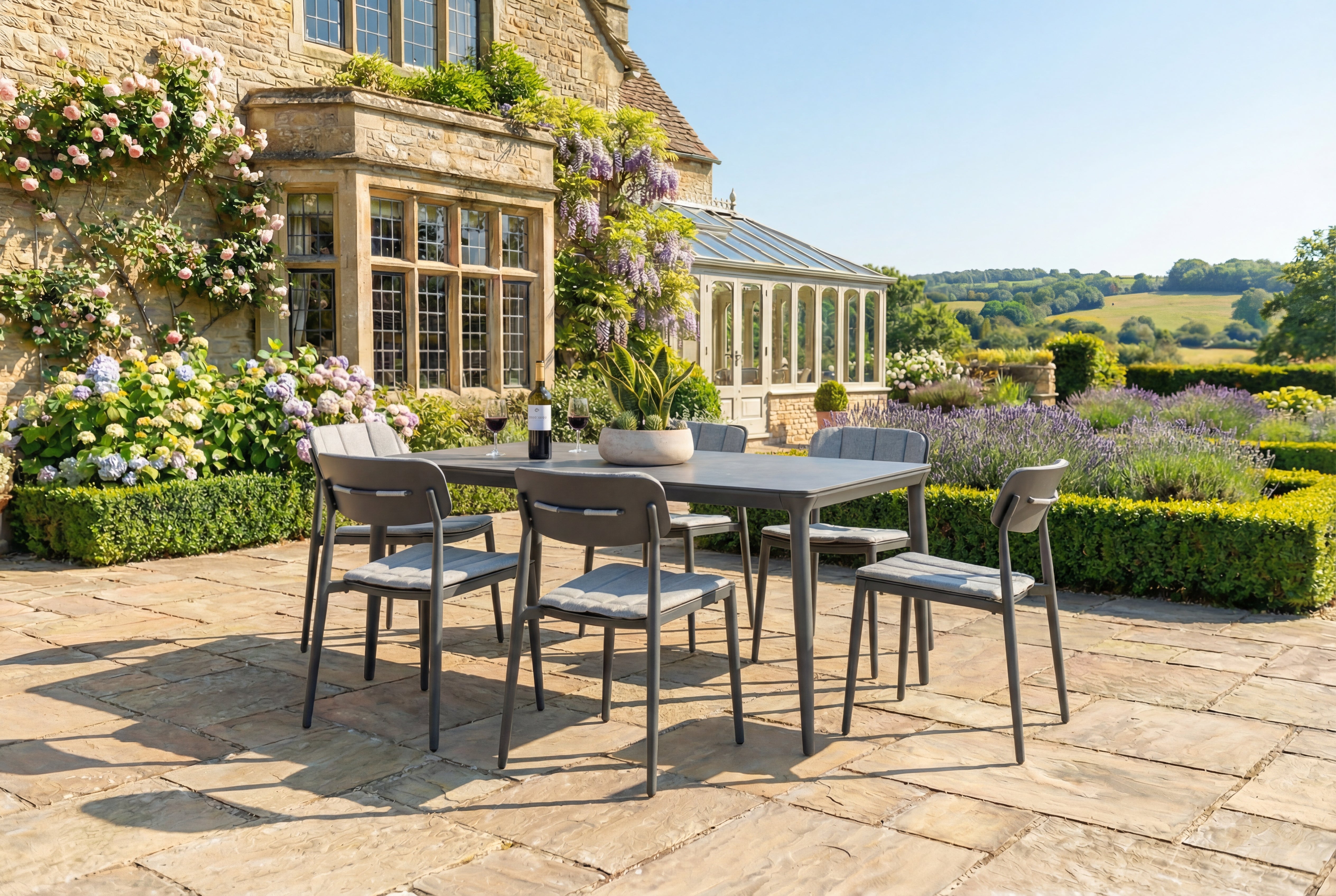 Outdoor patio set with table and chairs in a garden setting.