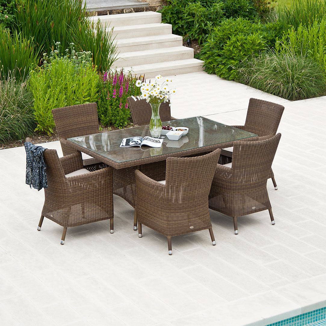 Alexander Rose rectangular garden table San Marino range in a superior rattan style weave with 6 rattan armchairs.