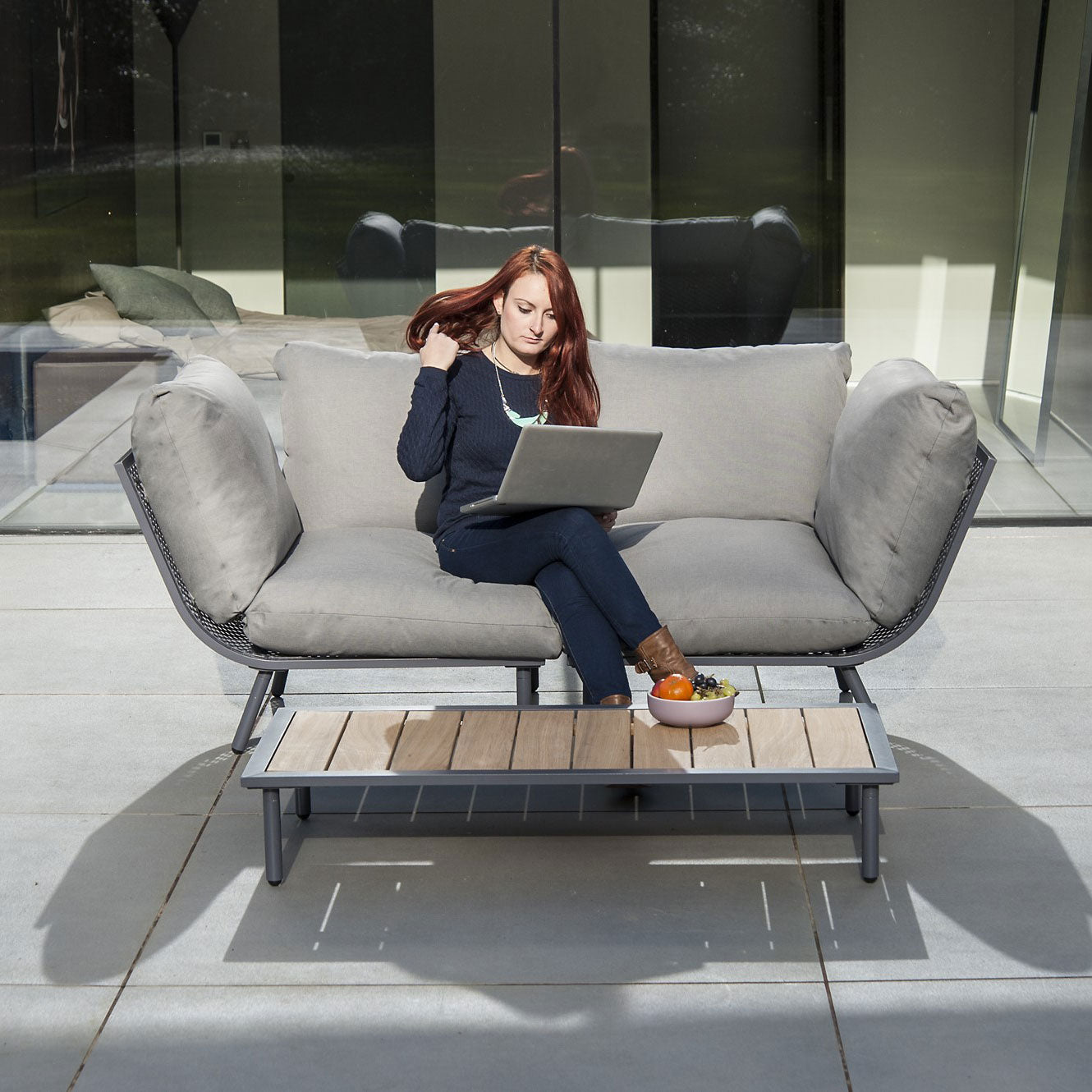 Beach sofa set with grey cushions and roble topped coffee table