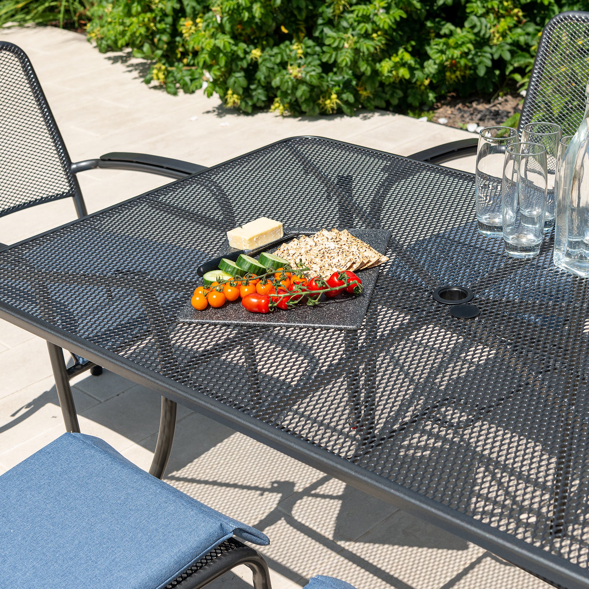 close up of garden metal table with food
