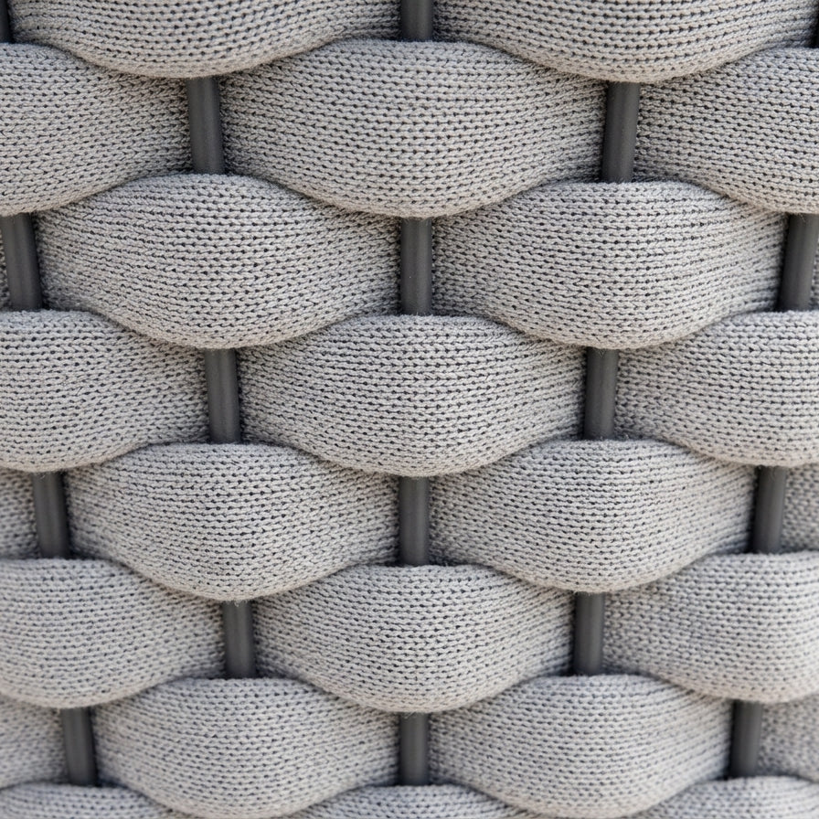 Close-up of a textured woven pattern in grey tones