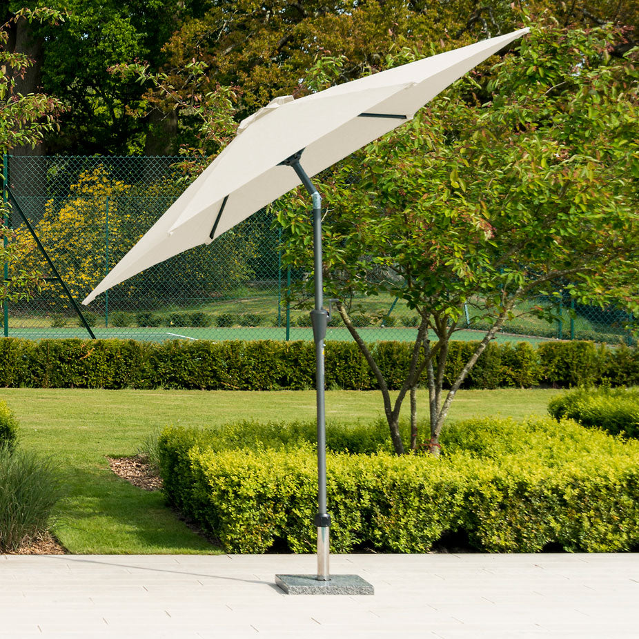 garden parasol in ecru or cream with stand and base