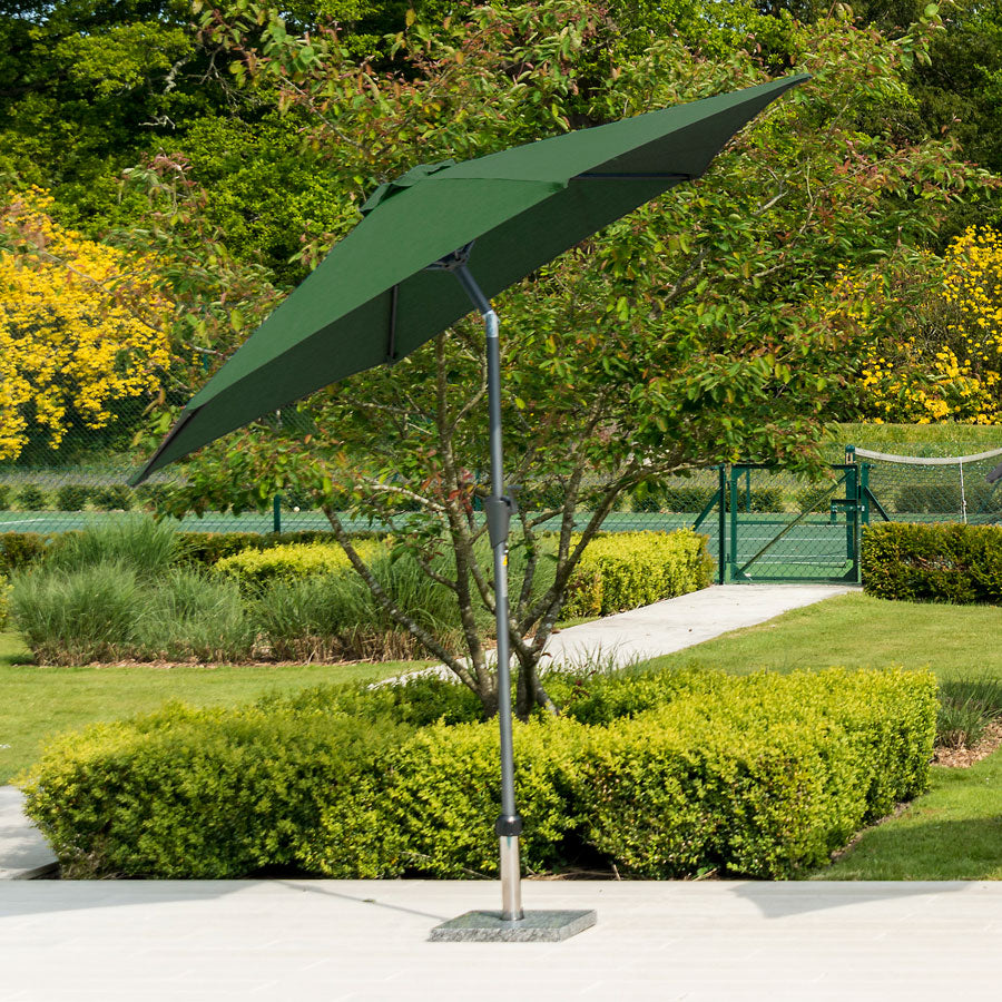green garden parasol with stand and base