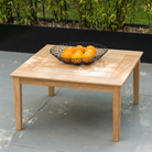 Small roble coffee table with a basket or oranges