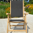 sling back wooden chair with dark grey fabric back and seat