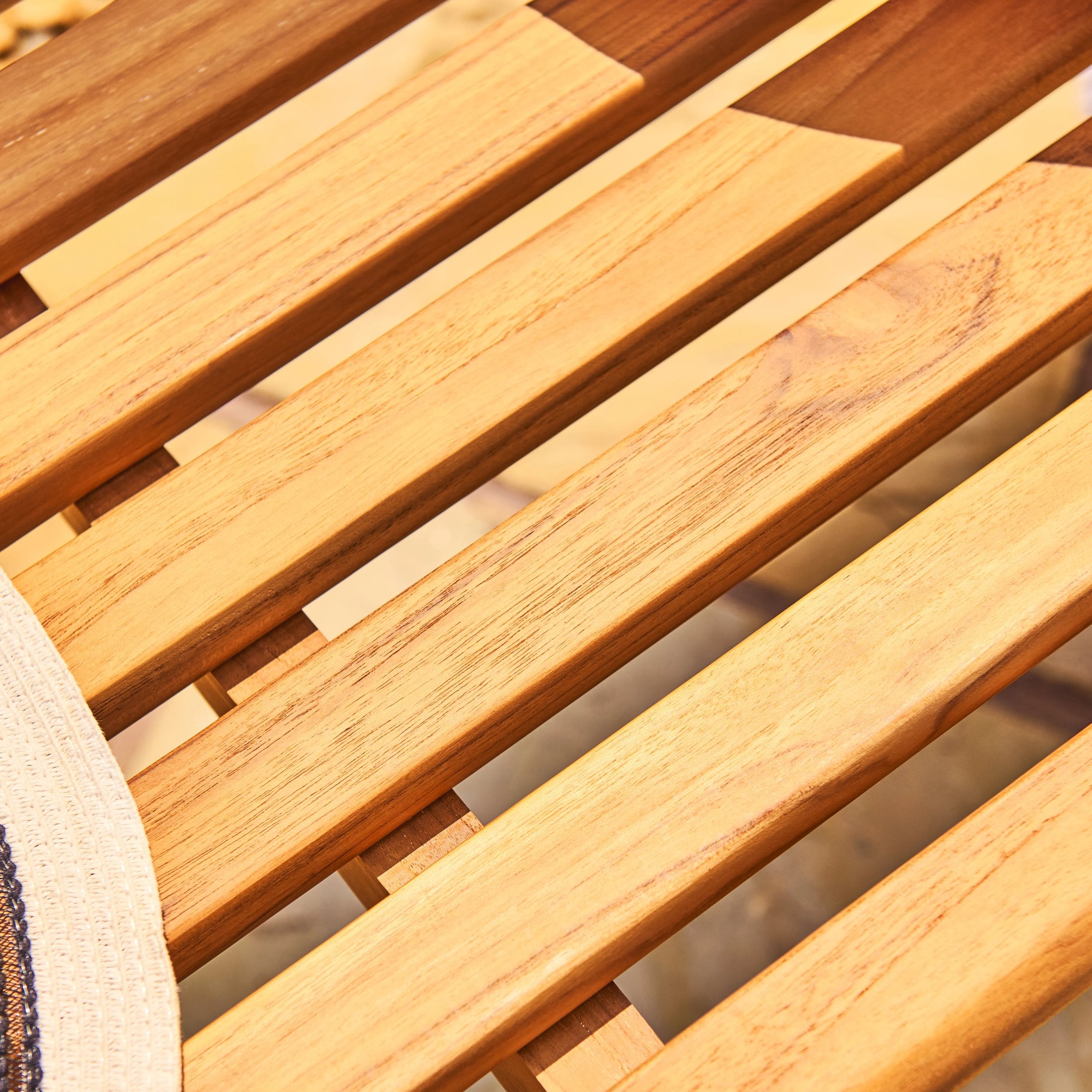 Close-up of a wooden table with slats