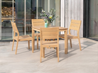 A 5-piece outdoor dining set consisting of a rectangular wooden table and four matching slatted chairs, styled on a concrete patio in front of a glass-walled patio room.