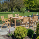 Rectangular garden table with 6 arm chairs part of the Alexander Rose roble range