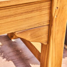 Close-up of a wooden chair with a blurred background