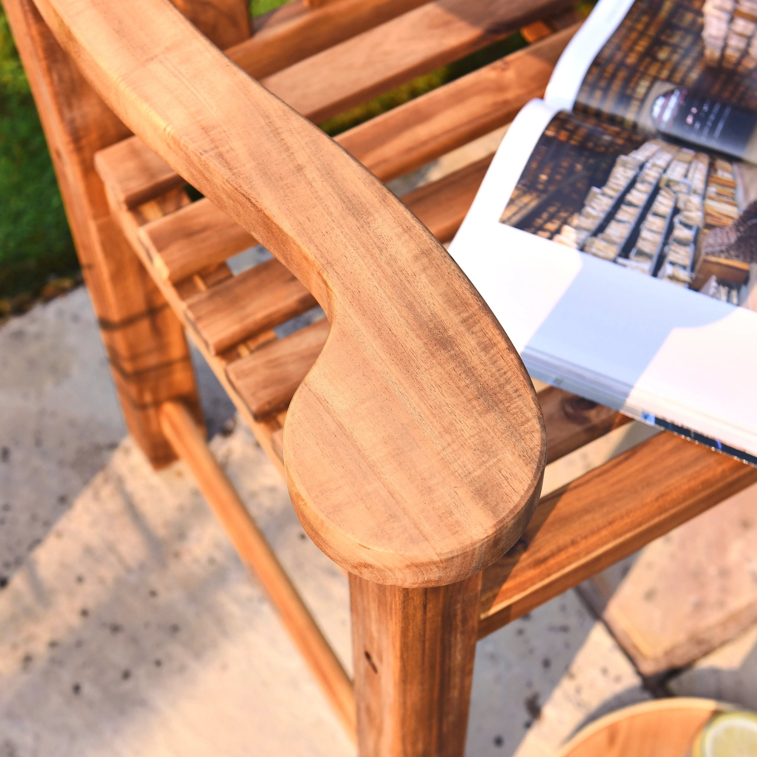 Wooden chair with a book on top, outdoors