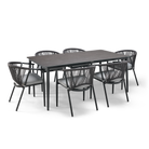 Dining table set with six chairs on a white background