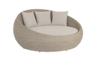 Round wicker outdoor sofa with cushions on a white background