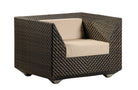 Wicker armchair with beige cushion on a white background