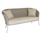 Wicker outdoor sofa with beige cushions on a white background