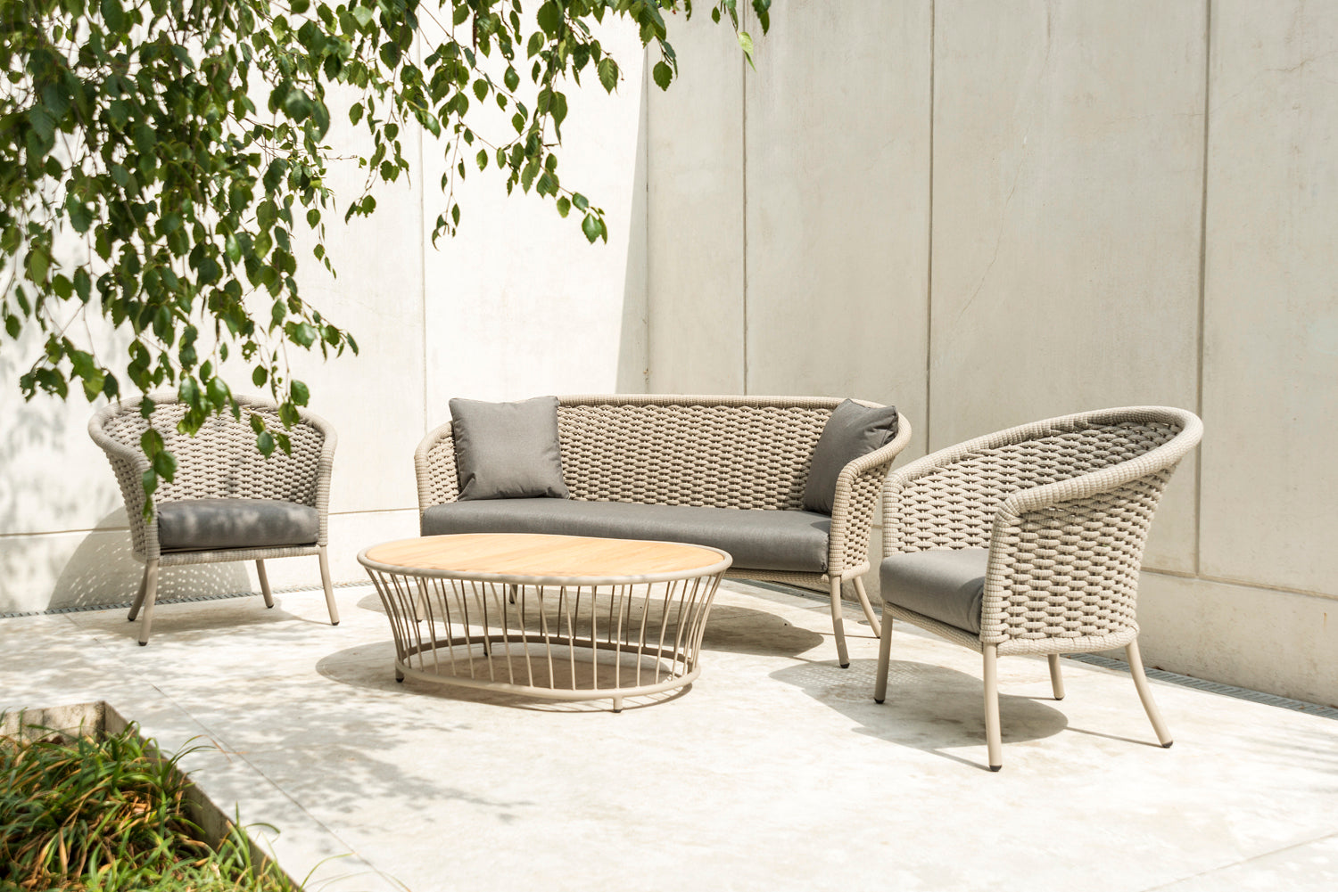 Cordial outdoor lounge set with sofa, chairs and coffee table in beige by Alexander Rose