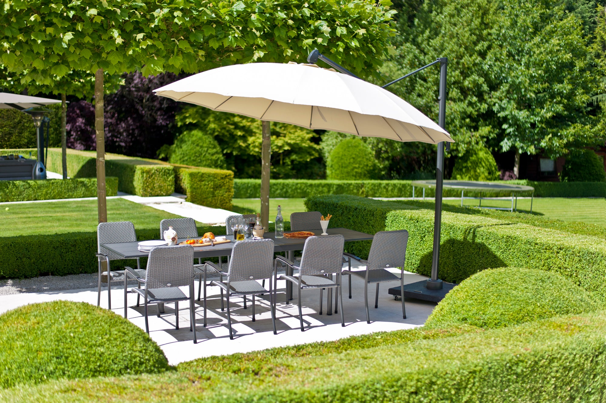 outdoor parasol shading luxury garden chairs