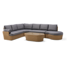 Sectional outdoor sofa with wicker frame and gray cushions on a white background