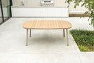 Cordial rectangular slatted wood top table with curved corners and 4 beige legs