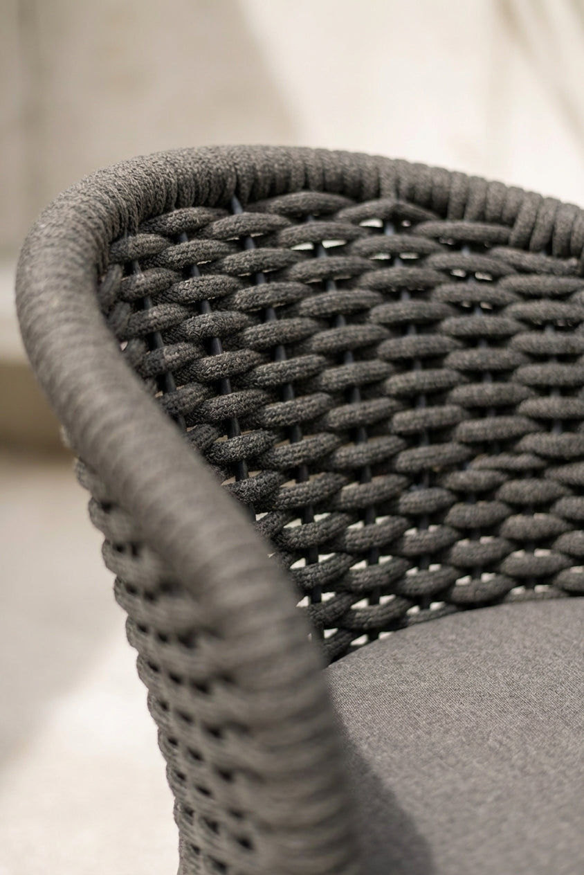 Close-up of a textured chair seat with woven pattern