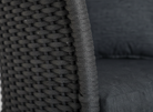 Woven chair detail on a cordial chair in dark grey
