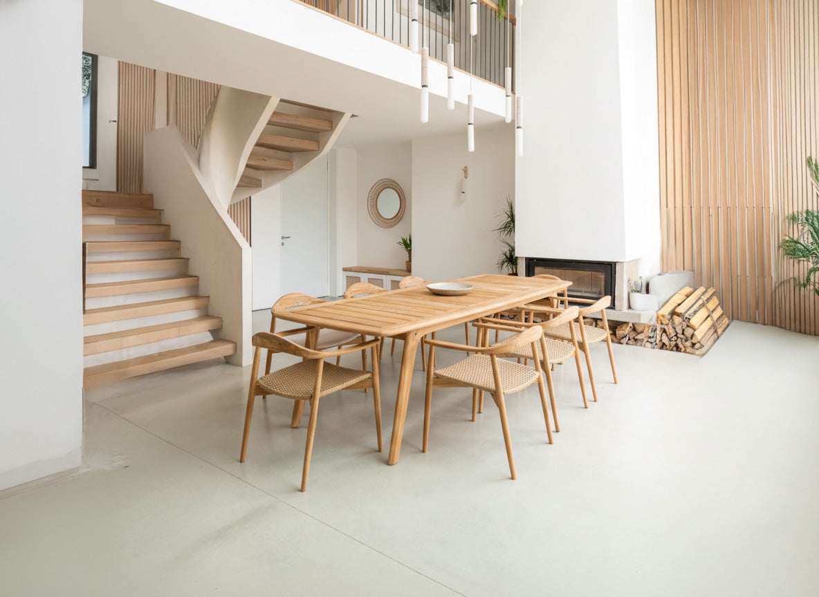 Modern dining area with wooden table and chairs in a home interior.