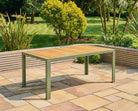 Genoa sage green rectangular dining table on a patio