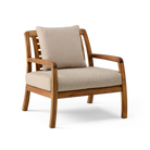 Wooden armchair with beige cushions on a white background