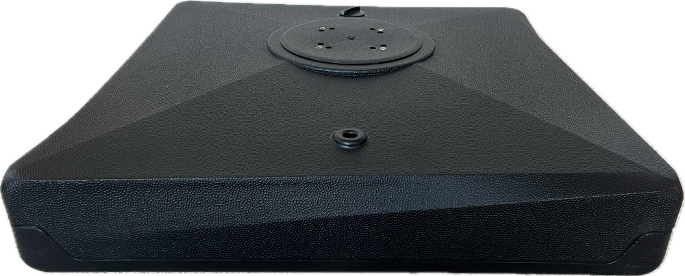Black rectangular object with a circular component on a white background