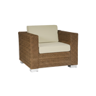 Wicker armchair with beige cushion on a transparent background