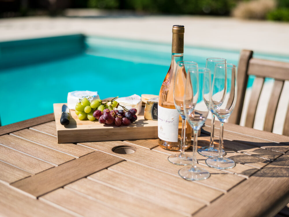 sherwood table with wine and snacks