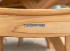 Alexander Rose metal logo on wooden furniture