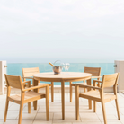 roble tivoli high back chairs and round dining table
