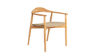 Wooden chair with woven seat on a white background