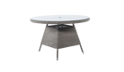 Round outdoor table with wicker frame and glass top on a white background