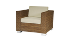 Wicker armchair with beige cushion on a white background