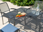 close up of garden metal table with food