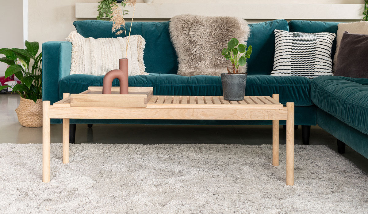 trak bench used as a coffee table in lounge