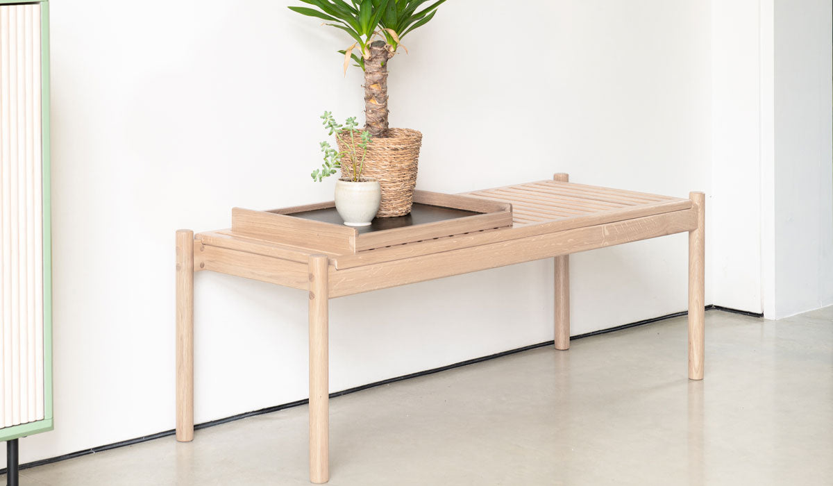 trak bench with tray in light oak in hallway