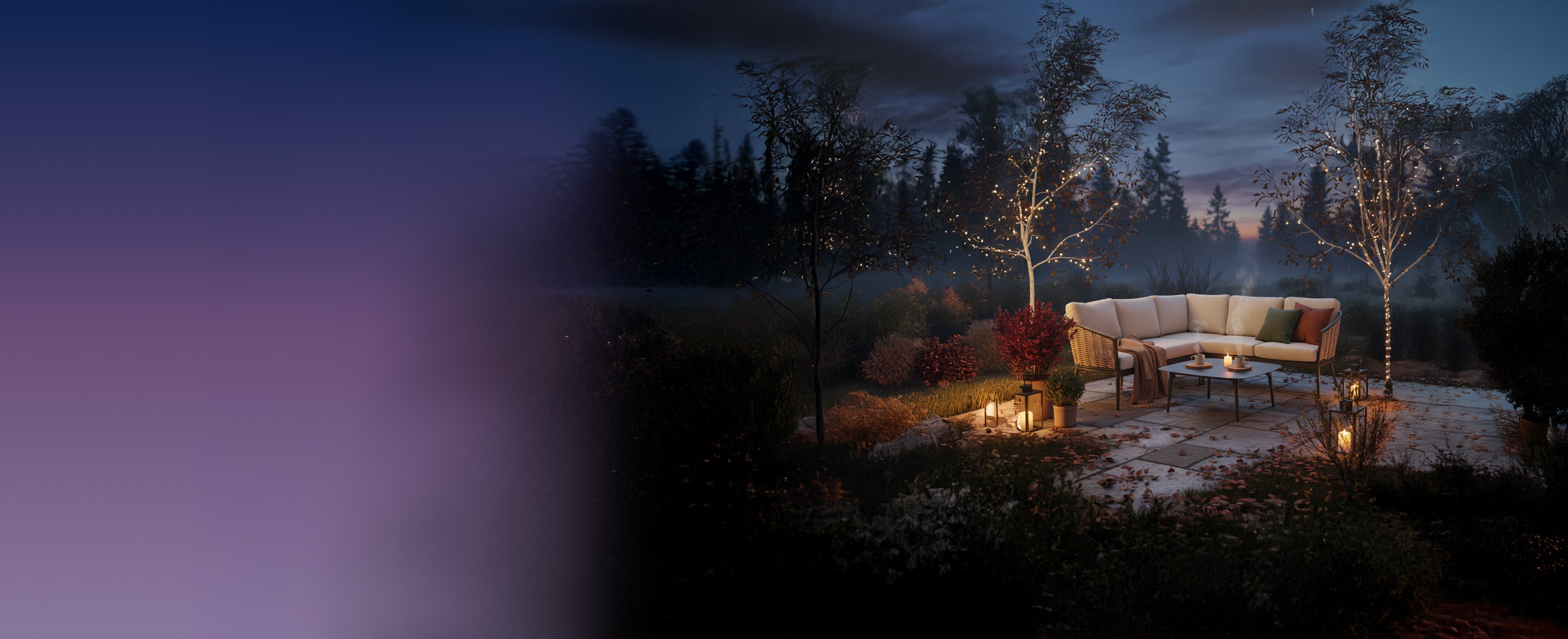 Outdoor evening setting with a lit patio table and sofa in a forest.